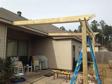 how to attach metal patio cover to house|attaching patio to existing house.